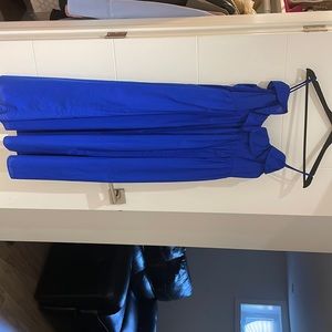 This dress does not have tag, but has never been worn before so it’s brand new!